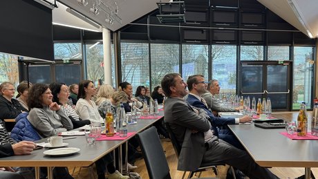 Zuhörende beim Pflegemanagement-Symposium